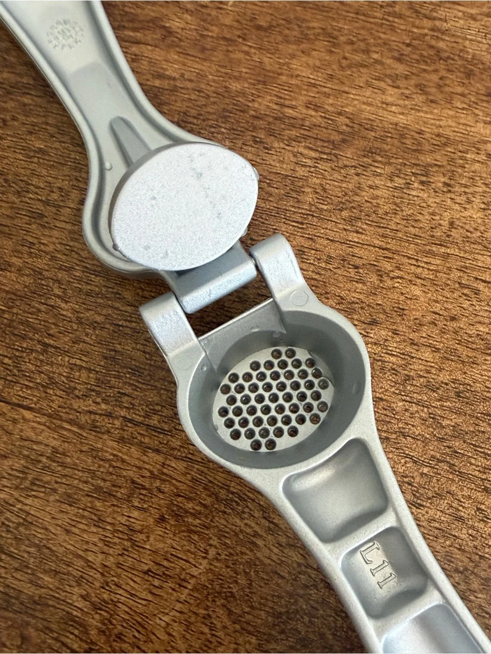 The PAMPERED CHEF Cast Aluminum Garlic Press